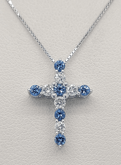 Blue and white diamond cross pendant on a silver chain